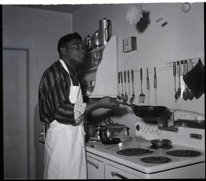 Framed Print : Floyd Patterson Flips Pancake in Kitchen Framed Print : Floyd Patterson Flips Pancake in Kitchen