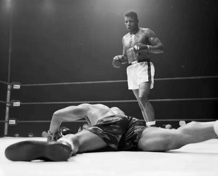 Framed Print : Floyd Patterson Standing Above Archie Moore During Fight Framed Print : Floyd Patterson Standing Above Archie Moore During Fight