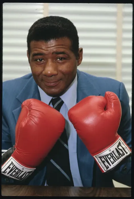 Framed Print : Floyd Patterson Wearing Boxing Gloves