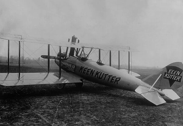 Flying Billboard. A Curtiss Oriole biplane advertising the Simmons Hardware Company