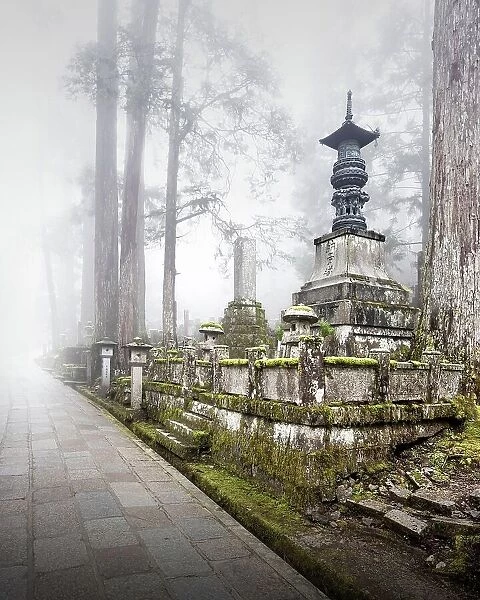 Fog over one of 200, 000 tombs at the old Okunion cemetery in Koya-San, Osaka, Japan
