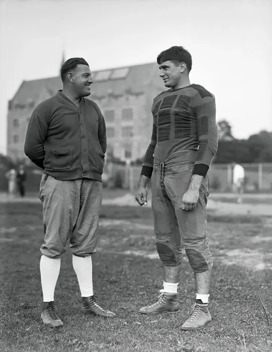 Framed Print : Football Coach and Captain Conversing Framed Print : Football Coach and Captain Conversing