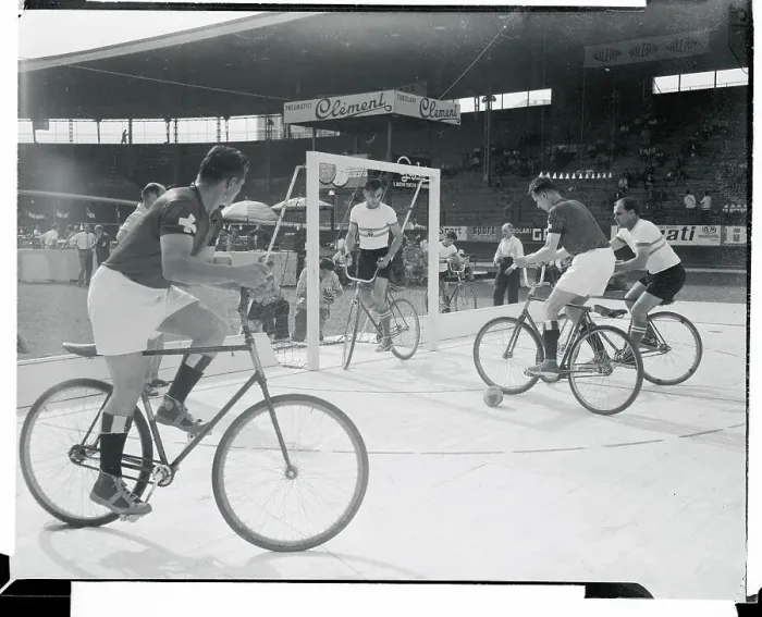 Framed Print : Football Cyclist at Net Framed Print : Football Cyclist at Net