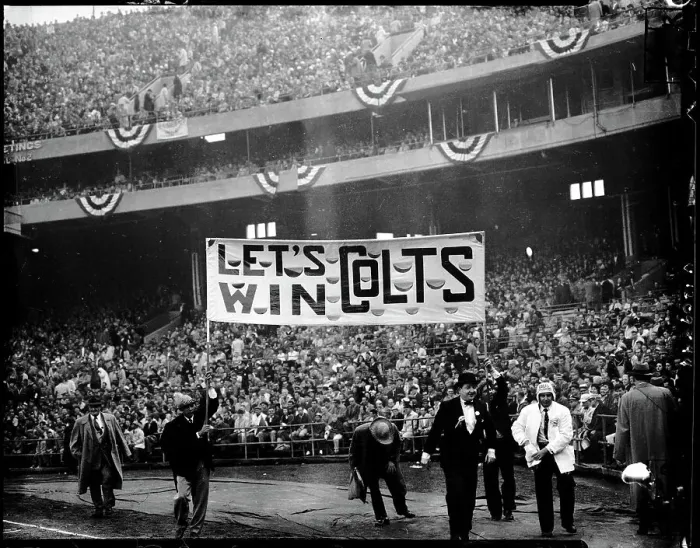 Framed Print : Football Fans Displaying Sign