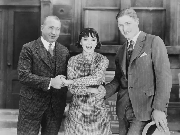 Framed Print : Football Greats and Actress Colleen Moore Joining Hands Framed Print : Football Greats and Actress Colleen Moore Joining Hands