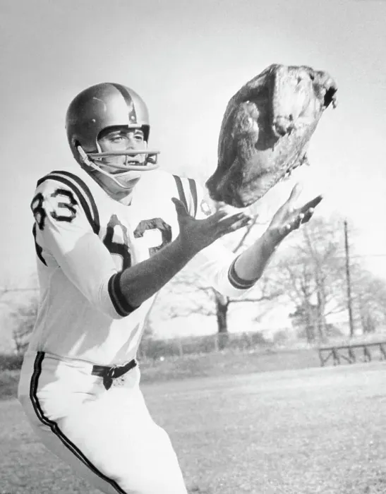 Framed Print : Football Player Catching Turkey Framed Print : Football Player Catching Turkey
