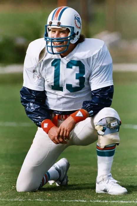 Framed Print : Football Player Dan Marino Kneeling on the Field Framed Print : Football Player Dan Marino Kneeling on the Field