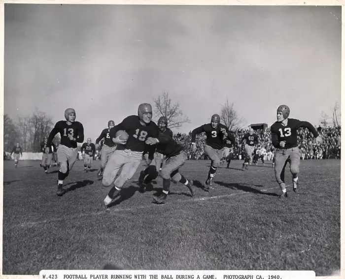 Framed Print : Football Player Running With Ball Framed Print : Football Player Running With Ball