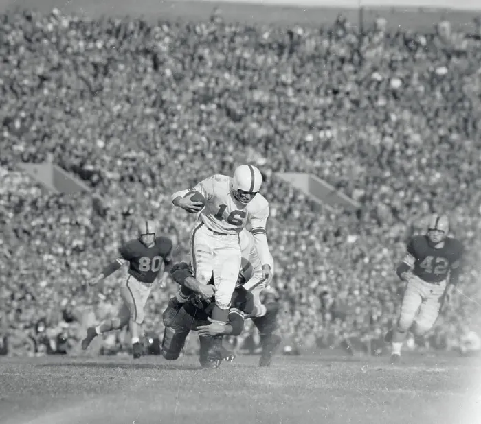 Framed Print : Football Player Tackling His Opponent Framed Print : Football Player Tackling His Opponent