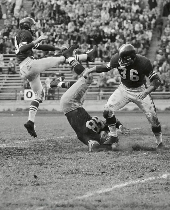 Framed Print : Football Players in Awkward Positions During Game Framed Print : Football Players in Awkward Positions During Game