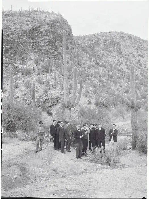Framed Print : Football Players Inspecting Cactus Framed Print : Football Players Inspecting Cactus