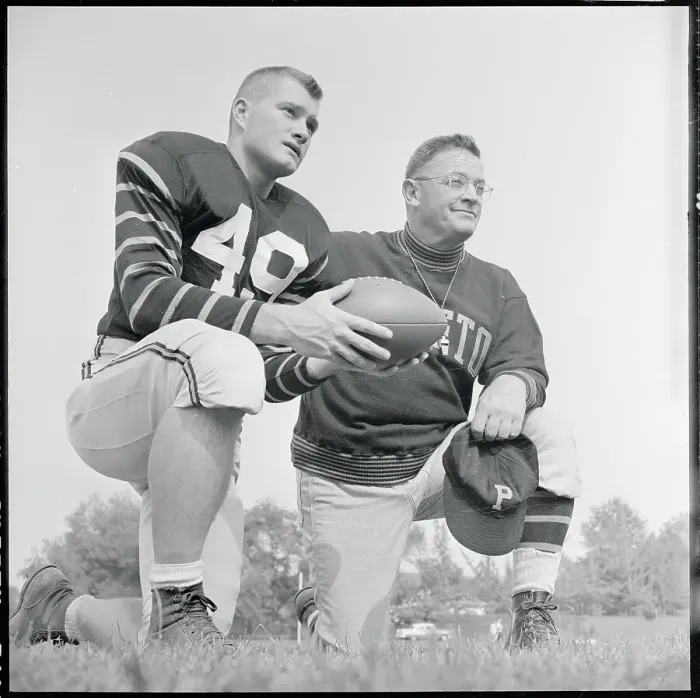 Framed Print : Football Players Pausing on the Field Framed Print : Football Players Pausing on the Field