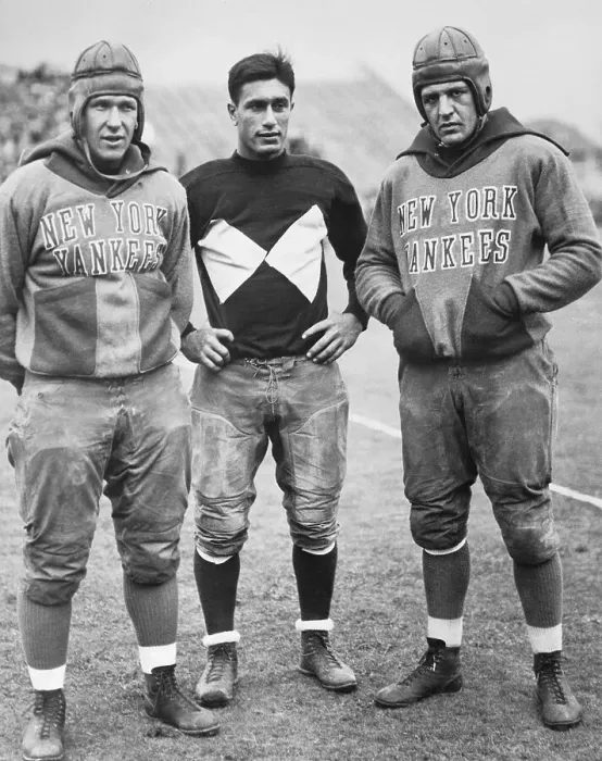 Framed Print : Football Players Posing Framed Print : Football Players Posing