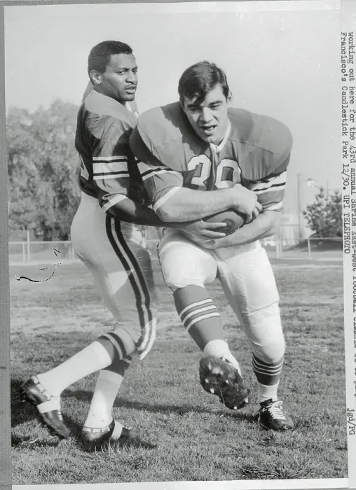 Framed Print : Football Players Practicing for Upcoming Game Framed Print : Football Players Practicing for Upcoming Game