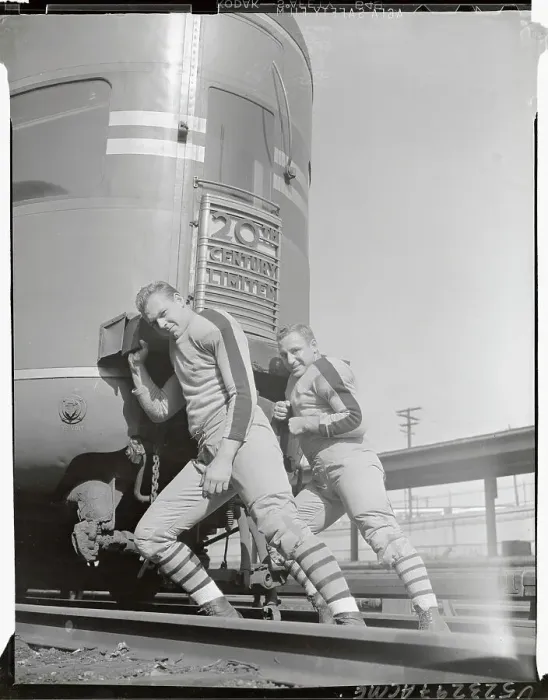 Framed Print : Football Players Pushing Railroad Car Framed Print : Football Players Pushing Railroad Car