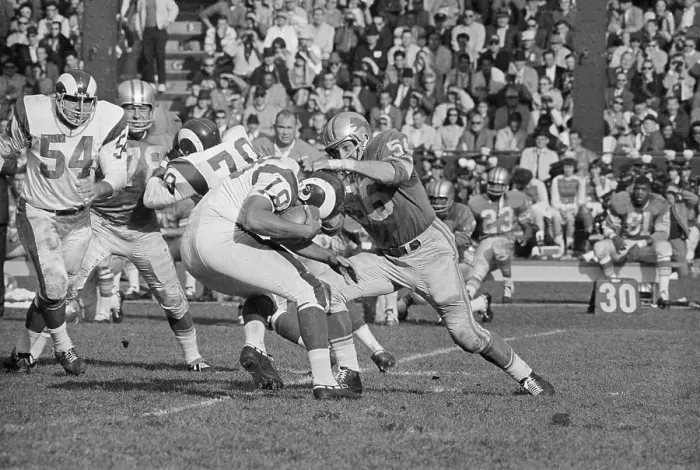 Framed Print : Football Players in Rigorous Action Framed Print : Football Players in Rigorous Action