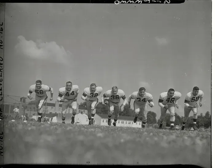 Framed Print : Football Players Running