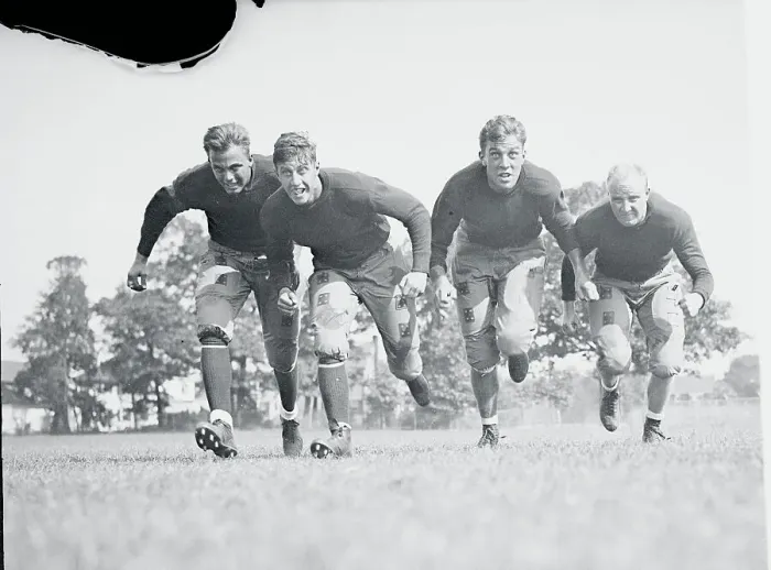 Framed Print : Football Players Running at Practice Framed Print : Football Players Running at Practice