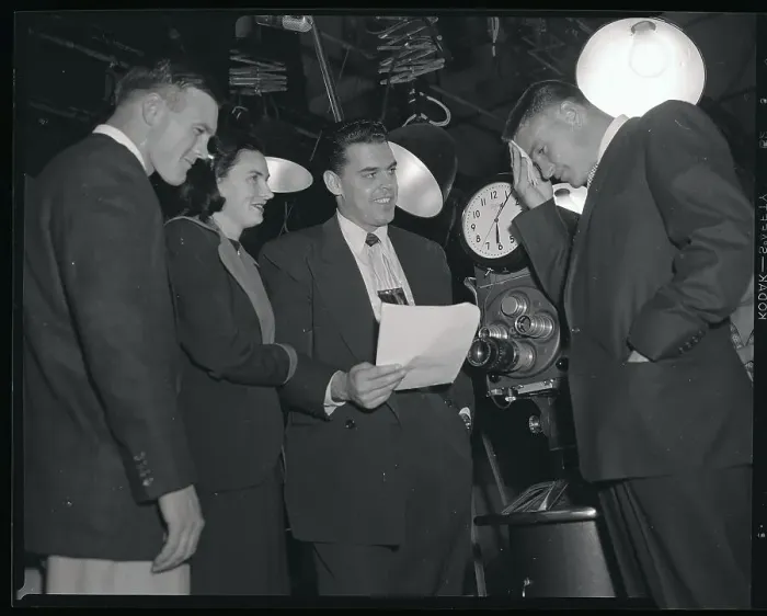  : Football Players at TV Set