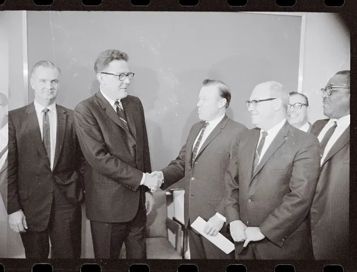 Framed Print : Ford Motor Company and United Auto Workers Shaking Hands