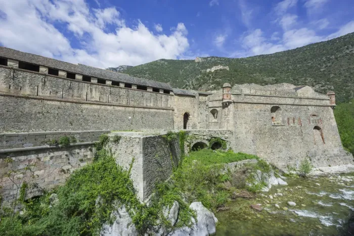 Framed Print : Fortification on the river La Tet, behind Fort Liberia, UNESCO World Heritage Site, Villefranche-de-Conflent, Languedoc-Roussillon, France Framed Print : Fortification on the river La Tet, behind Fort Liberia, UNESCO World Heritage Site, Villefranche-de-Conflent, Languedoc-Roussillon, France