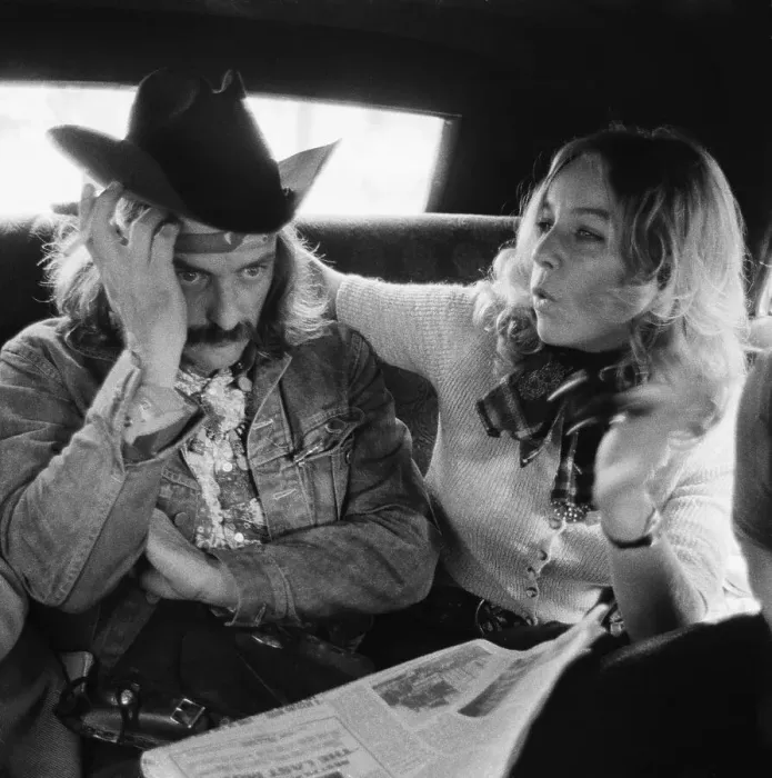 Framed Print : France Daunic Seated With Dennis Hopper Framed Print : France Daunic Seated With Dennis Hopper