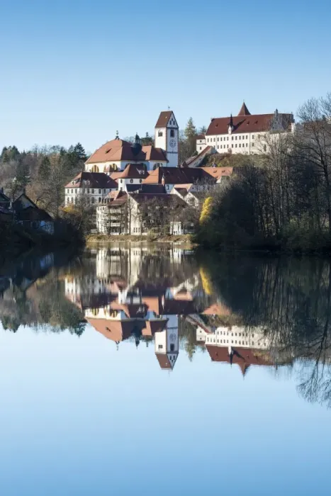 Framed Print : The former Franciscan Monastery of St. Mang, reflection in the Lech river, Fuessen, Ostallgaeu region, Allgaeu, Bavaria, Germany, Europe Framed Print : The former Franciscan Monastery of St. Mang, reflection in the Lech river, Fuessen, Ostallgaeu region, Allgaeu, Bavaria, Germany, Europe