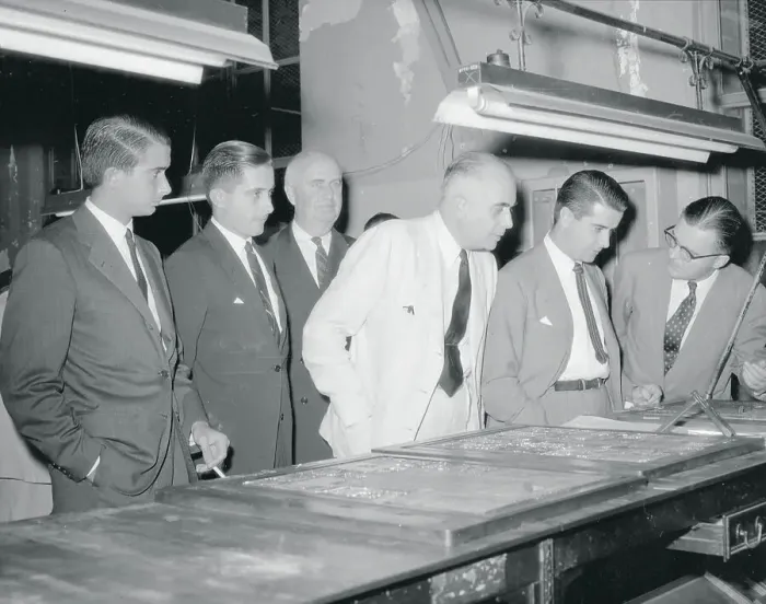 Framed Print : Frank Bartholomew and Colleagues Looking at Newspaper Plates Framed Print : Frank Bartholomew and Colleagues Looking at Newspaper Plates