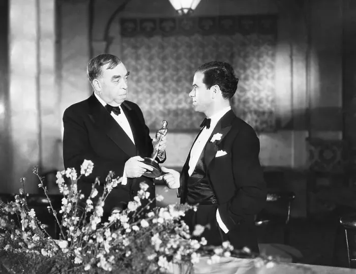 Framed Print : Frank Capra Receiving Oscar Framed Print : Frank Capra Receiving Oscar