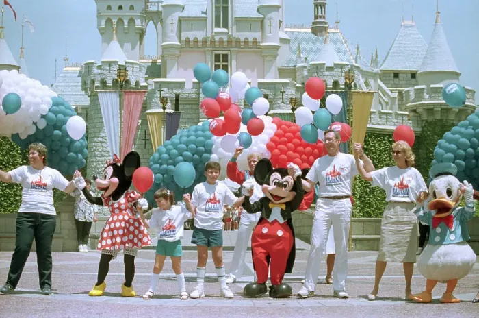 Framed Print : Frank G. Wells Posing with Disney Characters