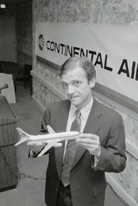 Framed Print : Frank Lorenzo Holding Model Airplane Framed Print : Frank Lorenzo Holding Model Airplane