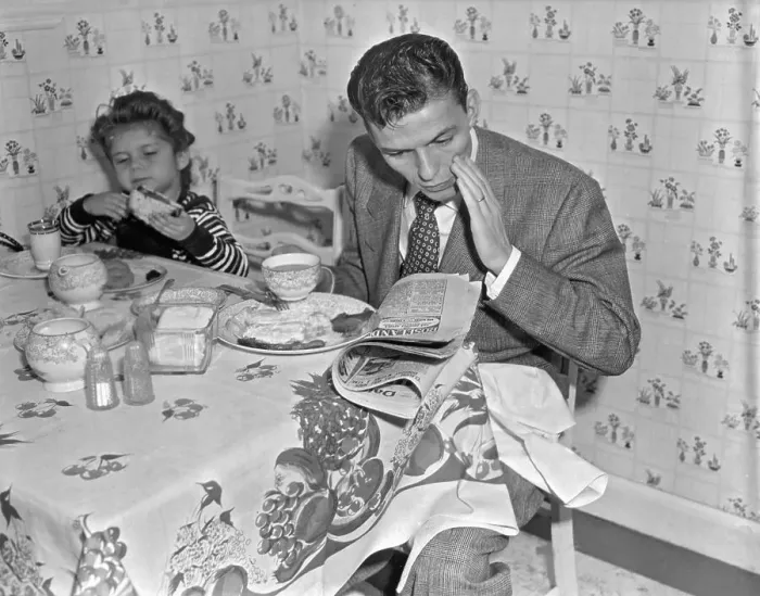 Framed Print : Frank Sinatra & Daughter Eating Reading Framed Print : Frank Sinatra & Daughter Eating Reading