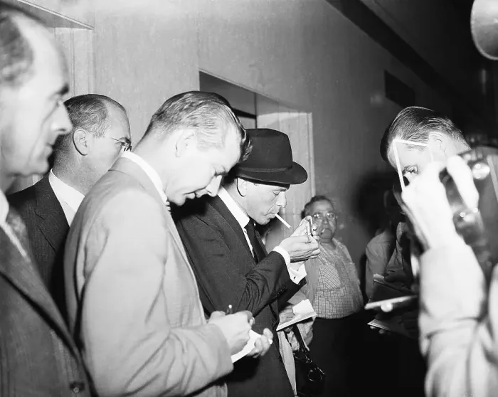 Framed Print : Frank Sinatra Lights Cigarette;Reporters Framed Print : Frank Sinatra Lights Cigarette;Reporters