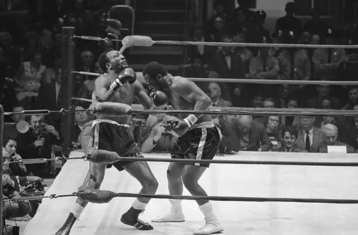 Framed Print : Frazier Slams Foster