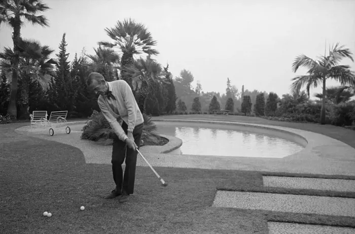 Framed Print : Fred Astaire Practicing Golf Shots Framed Print : Fred Astaire Practicing Golf Shots