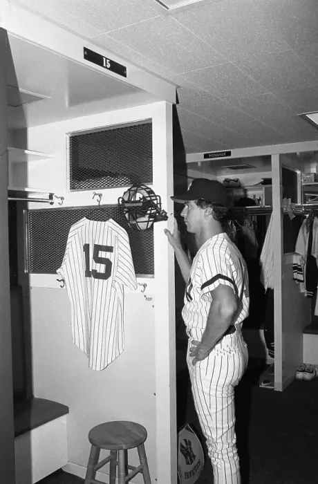 Framed Print : Fred Stanley Pauses in Front of Munson's Locker