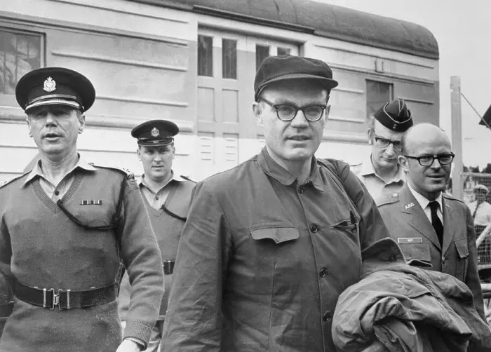 Framed Print : Freed CIA Agent John T. Downey Being Escorted at Train Station