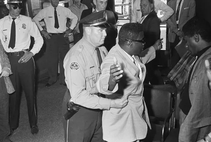 Framed Print : Freedom Rider Searched By a Policeman Framed Print : Freedom Rider Searched By a Policeman
