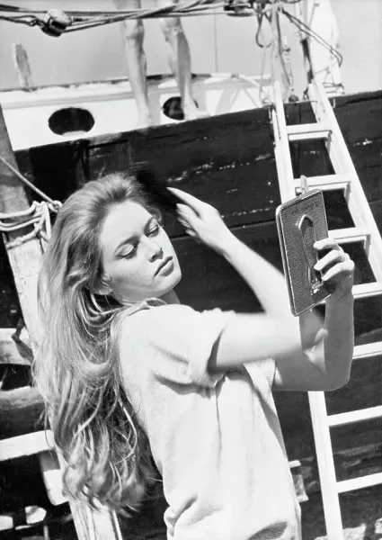 Brigitte Bardot Fixing Hair in Mirror Print, c.1958. Art Prints