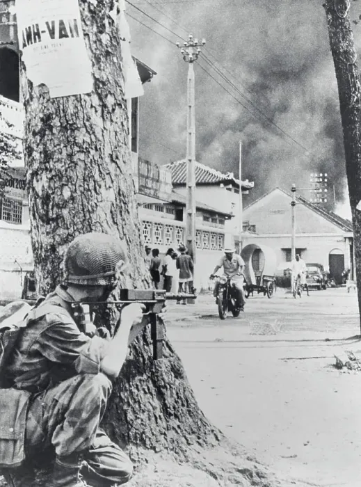 Framed Print : French Soldier Crouching Behind a Tree, Saigon 1955 Framed Print : French Soldier Crouching Behind a Tree, Saigon 1955