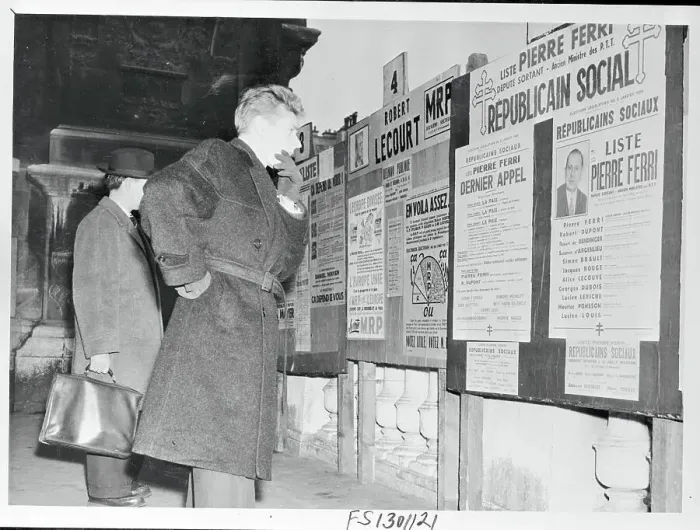Framed Print : French Voter Reading Election Posters Framed Print : French Voter Reading Election Posters