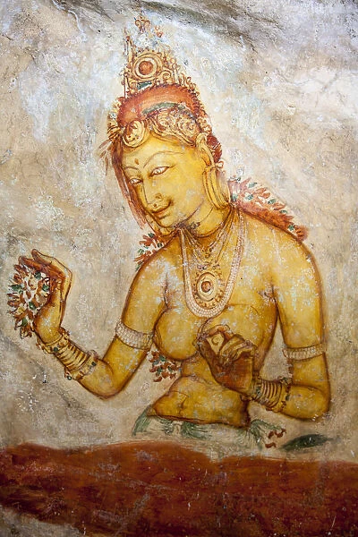 Frescoes depicting a bared chested woman