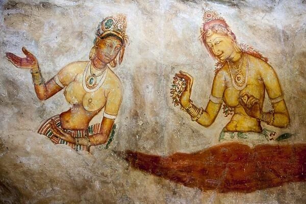 Frescoes depicting two bared chested women talking