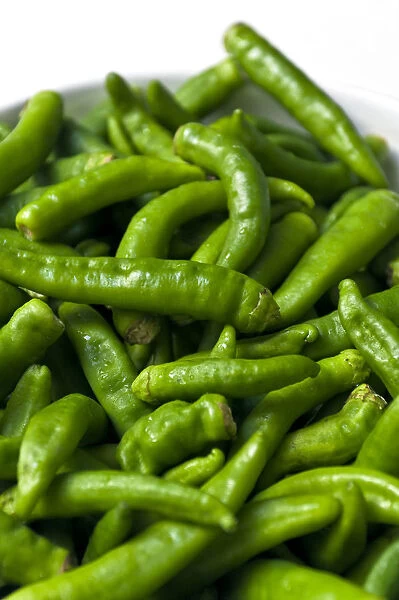 Fresh green chili peppers