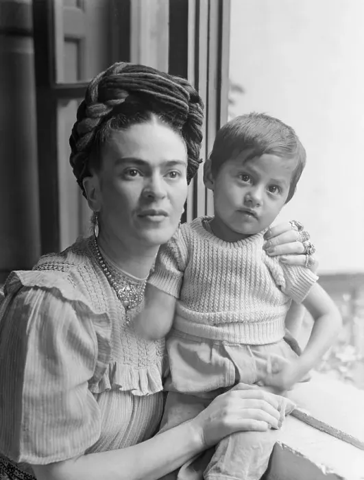 Framed Print : Frida Kahlo Holding Little Boy Framed Print : Frida Kahlo Holding Little Boy
