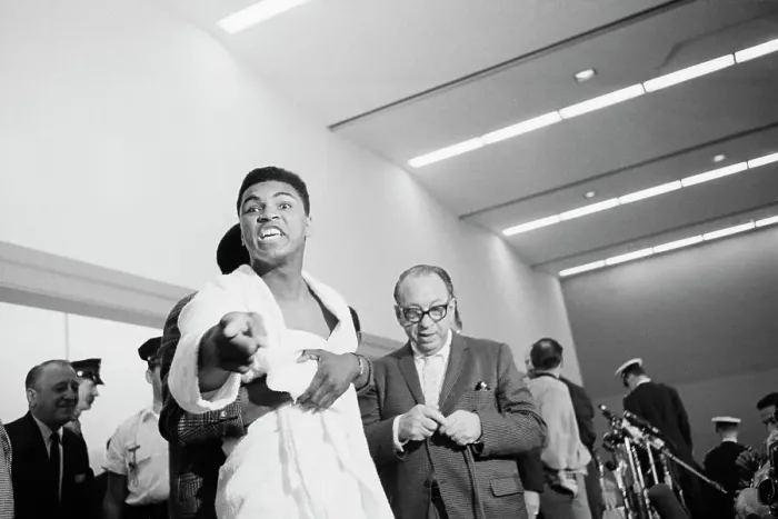 Framed Print : Friend Holds Back an Enraged Cassius Clay Framed Print : Friend Holds Back an Enraged Cassius Clay