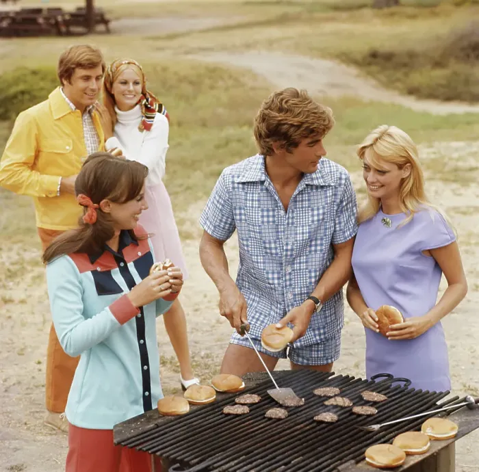Framed Print : Friends having barbecue, smiling Framed Print : Friends having barbecue, smiling