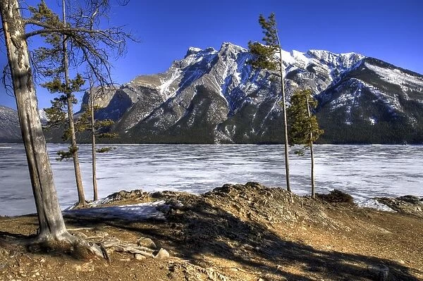 Frozen Lake Minnewanka and Mount Inglismaldie, Banff National Park, Alberta, Canada