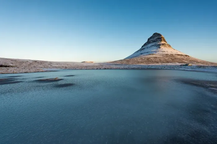 Framed Print : The frozen lake and Mt. Kirkjufell, Iceland Framed Print : The frozen lake and Mt. Kirkjufell, Iceland