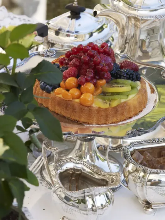 Framed Print : Fruit pie on antique, silver cake plate in a luxurious ambience of a stylishly set coffee table Framed Print : Fruit pie on antique, silver cake plate in a luxurious ambience of a stylishly set coffee table